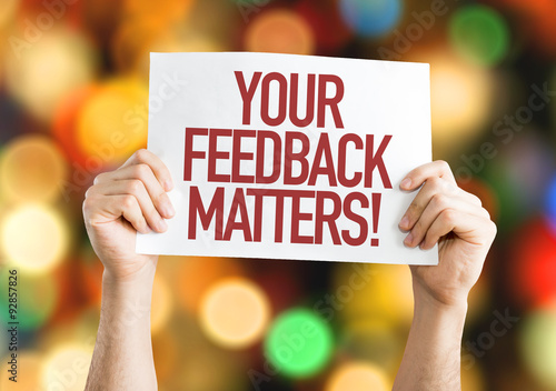 Your Feedback Matters placard with bokeh background photo