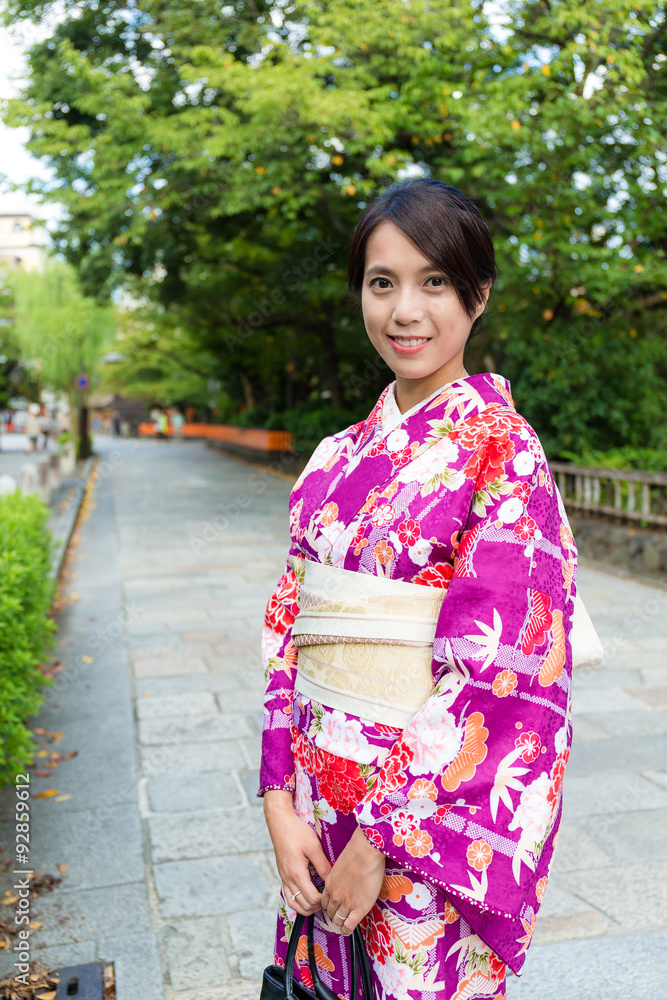 Woman with japanese traditional clothing at street