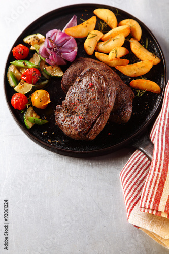 Tasty Beef Steak with Grilled Veggies on Skillet