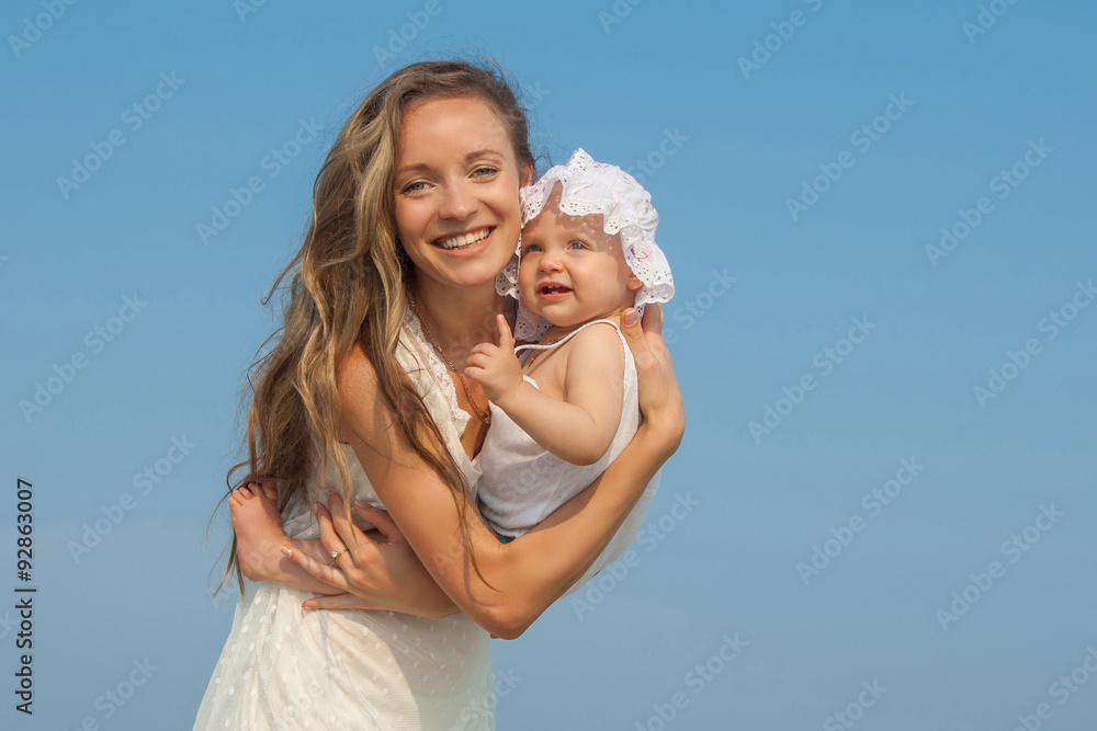 Happy beautiful mother and daughter enjoying Happy beautiful mother and daughter enjoying