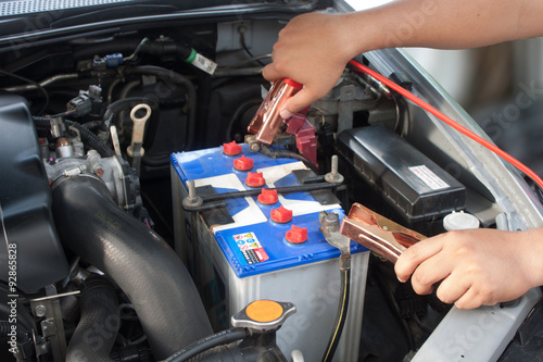 Charging battery car with electricity trough jumper cables