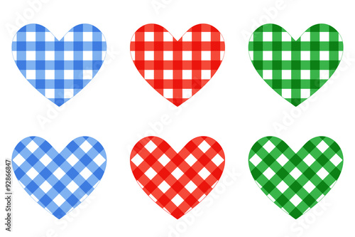 Blue, red and green hearts filled with checkered pattern isolated on white. Collection of linear and diagonal patterned isolated hearts.