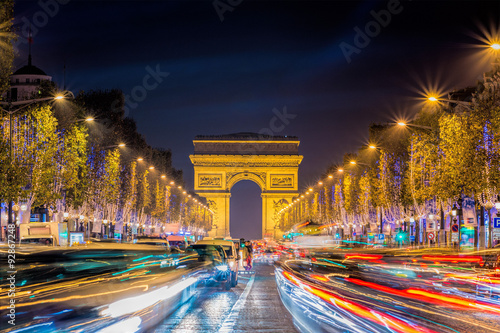 Avenue des Champs-Elysees with Christmas lighting leading up to the Arc de Triomphe in Paris, France © FelixCatana