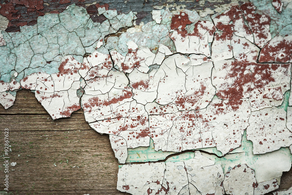 Naklejka premium Grunge wood with peeling paint , great background or texture