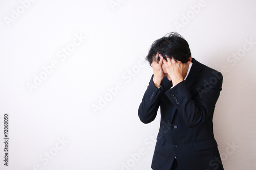 young asian businessman on white background