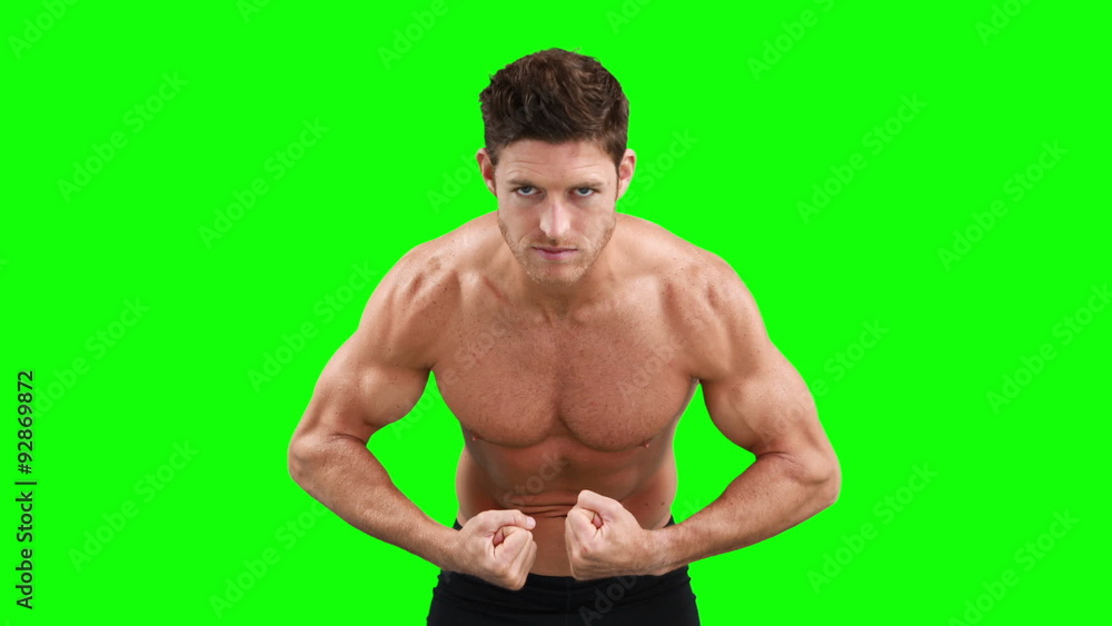 Muscular man flexing his muscles Muscular man flexing his muscles