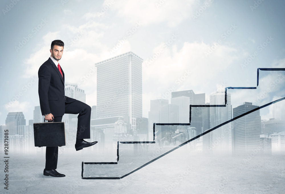 Business person in front of a staircase Business person in front of a staircase