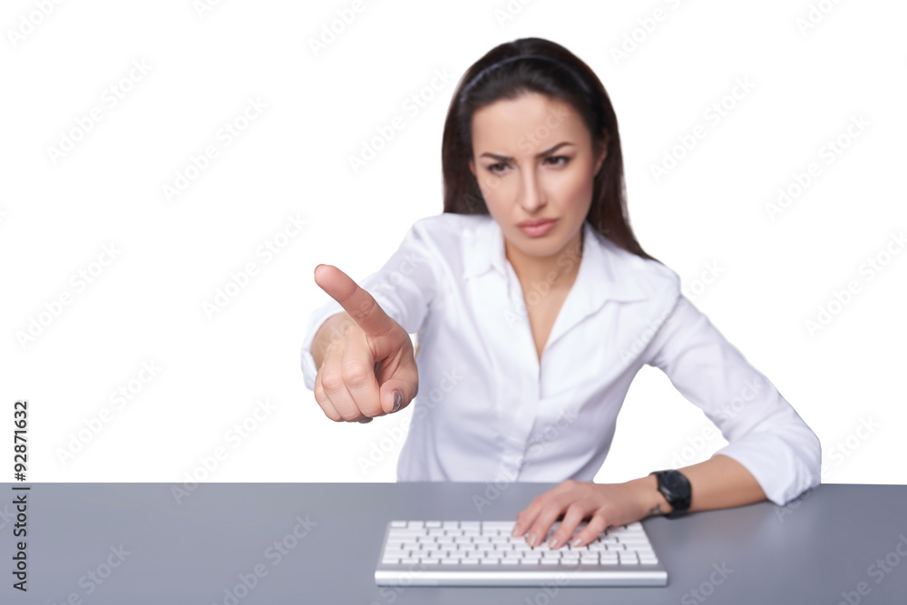 Business woman pointing at imaginary button Business woman pointing at imaginary button