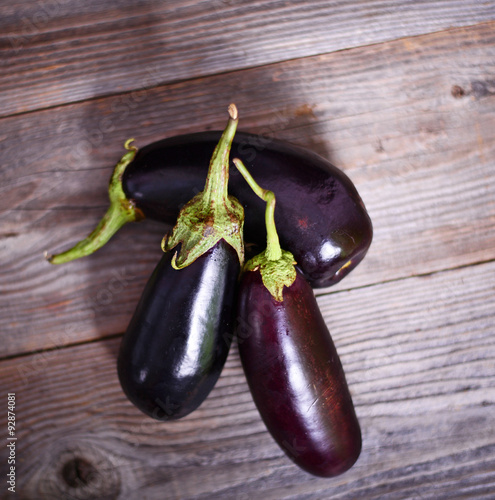 Eggplant on vintage wood background