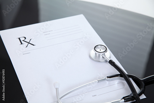 Wallpaper Mural Stethoscope and prescription, black reflective background Torontodigital.ca