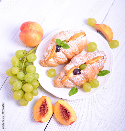 Fototapeta Naklejka Na Ścianę i Meble -  Fresh fruit croissant on white background