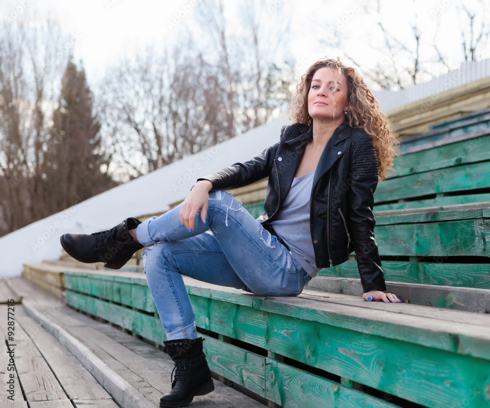 model posing on old stadium tribunes. model posing on old stadium tribunes.