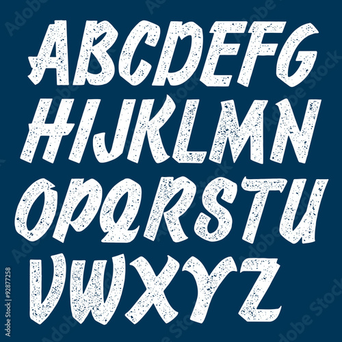Retro handmade script font. Stamped woodprinted letters.
