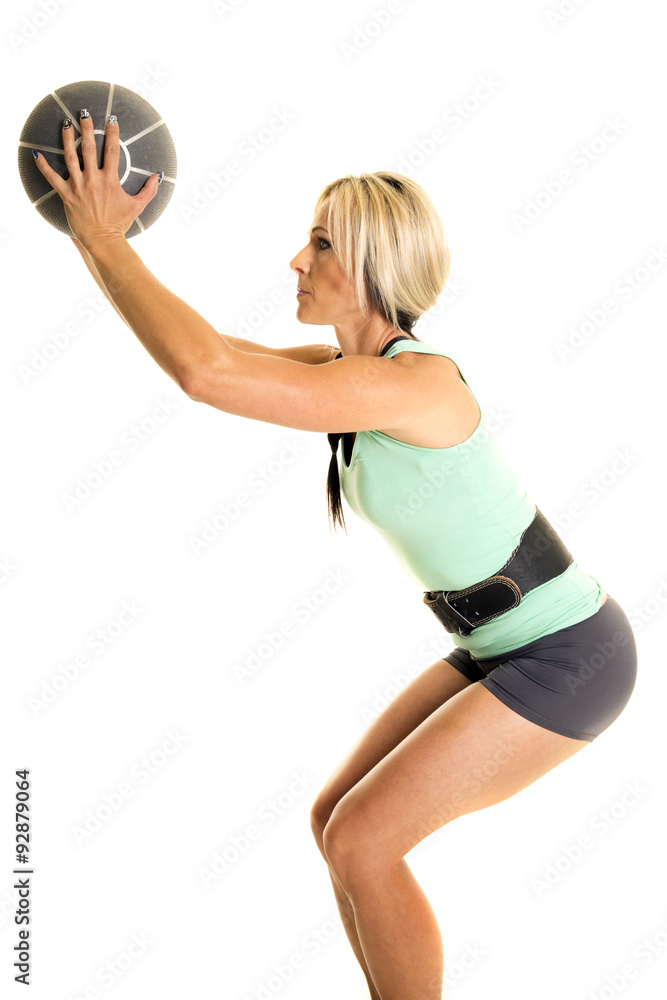 woman green fitness tank top side hold ball up woman green fitness tank top side hold ball up