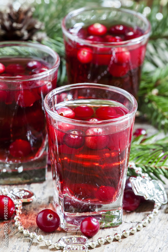 Cranberry drink on Christmas background, selective focus