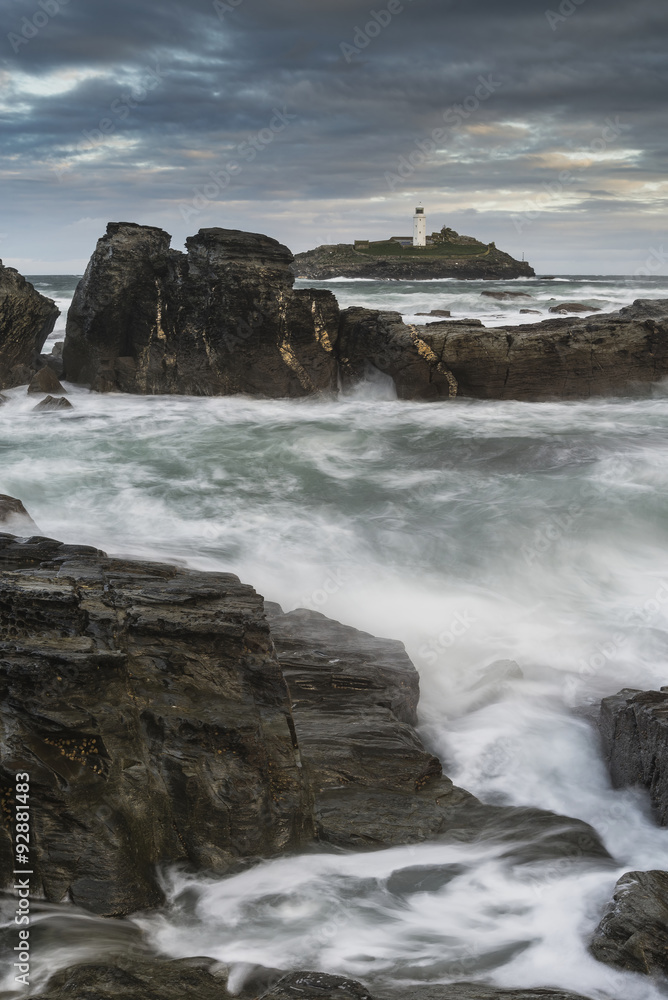 Beautiful sunrise landscape of Godrevy lighthouse on Cornwall co Beautiful sunrise landscape of Godrevy lighthouse on Cornwall co