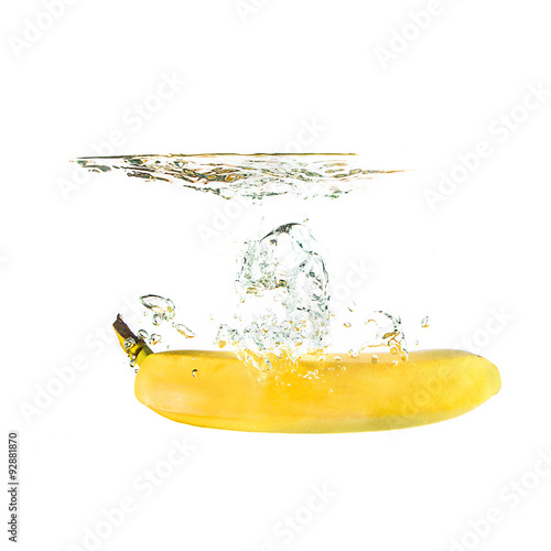 Banana splash on water, isolated
