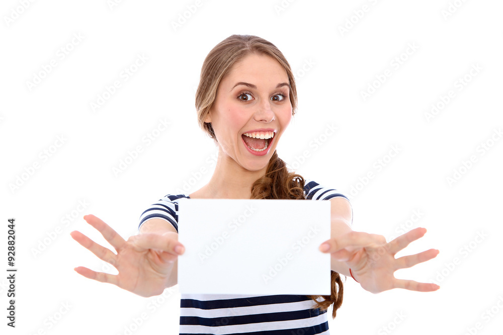 Student girl showing white blank sheet - copy space, isolated over background Student girl showing white blank sheet - copy space, isolated over background