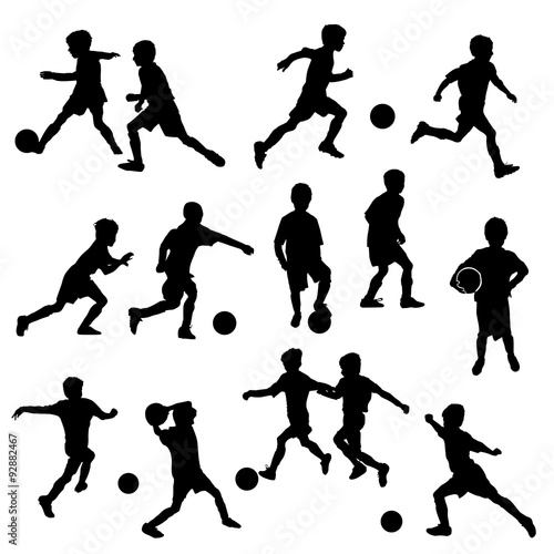 vector silhouettes of boys playing soccer or football