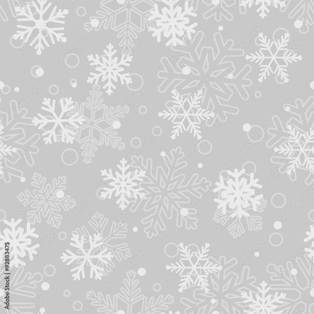 Seamless pattern of snowflakes, white on gray