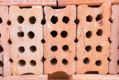 Close up Group of red bricks for construction site photo