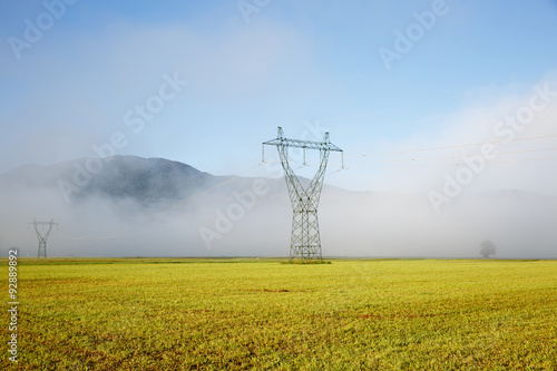 Obraz na płótnie Big electricity high voltage pylon with power lines w salonie