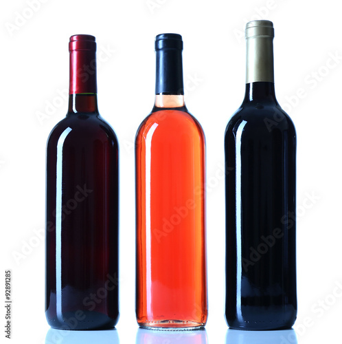 set of different wine bottles isolated on white background
