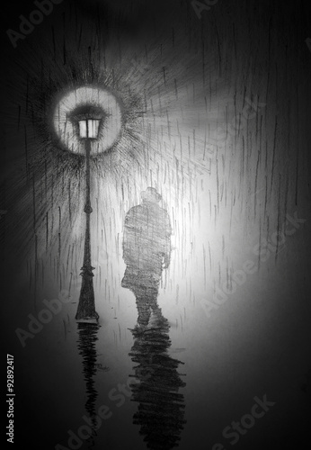man under a street lamp