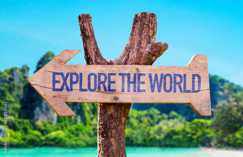 Explore the World arrow with beach background