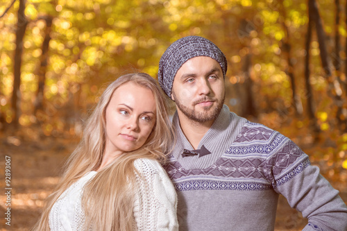 Young couple in autumn park vintage stylized © beerlogoff