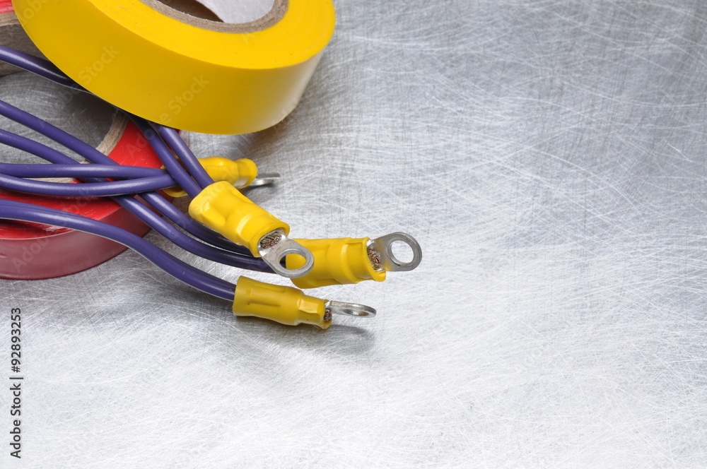 Cable and tape to use in electrical installations with place for text on grey metal surface