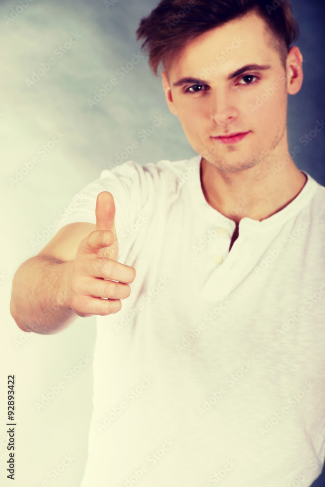 Cheerful man with thumbs up. Cheerful man with thumbs up.