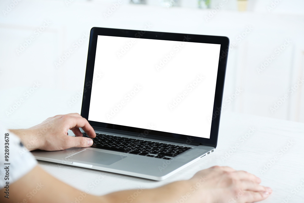 Man working with laptop in office Man working with laptop in office