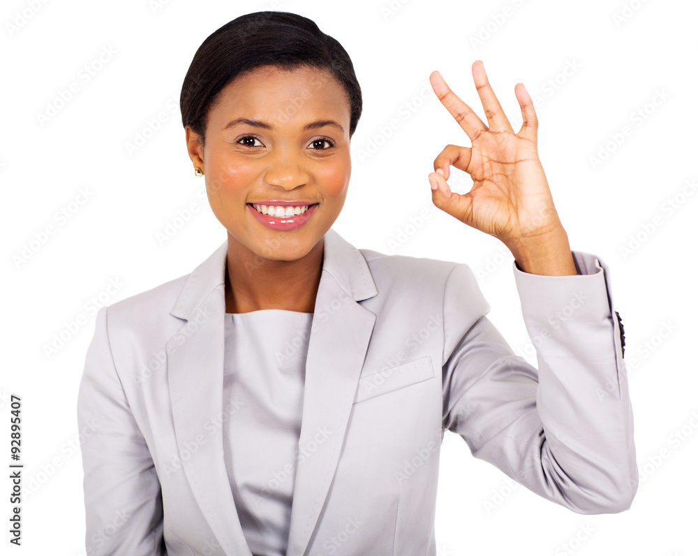 african american businesswoman giving ok hand sign african american businesswoman giving ok hand sign