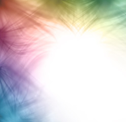 Wispy feathered rainbow colored edging border design - pastel colored feathery random pattern to top and left sides on a white background