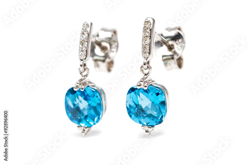 Isolated white gold aquamarine earrings with small diamonds