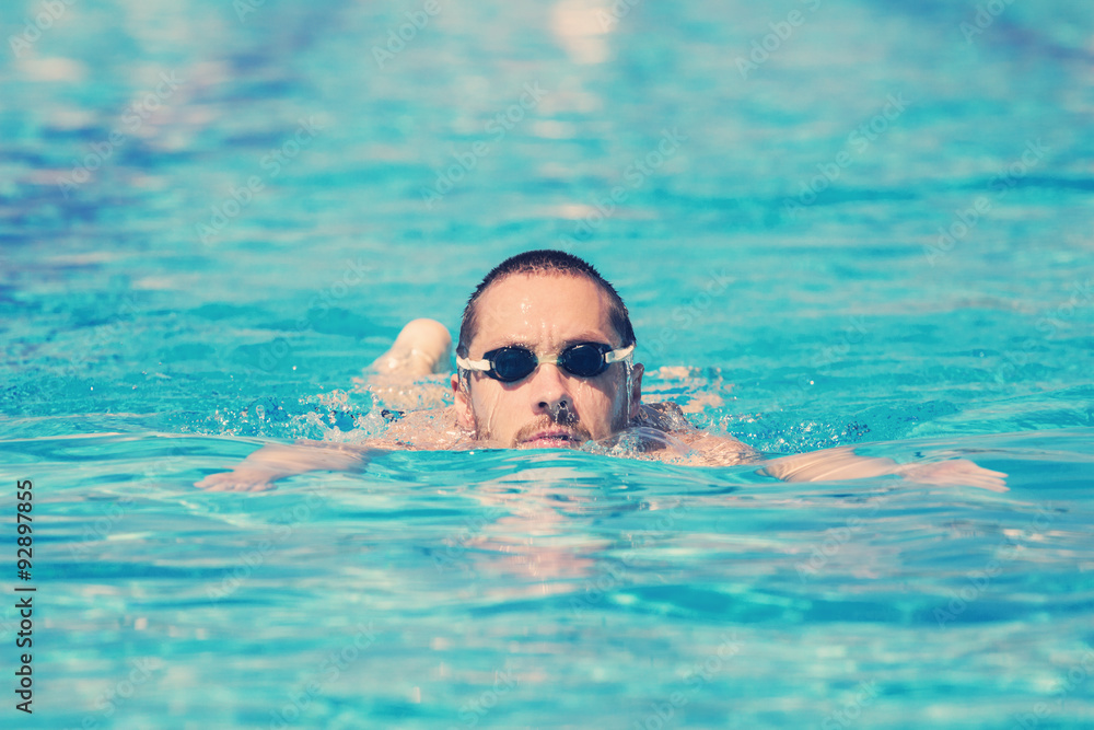 Sportsman swimming in a pool.