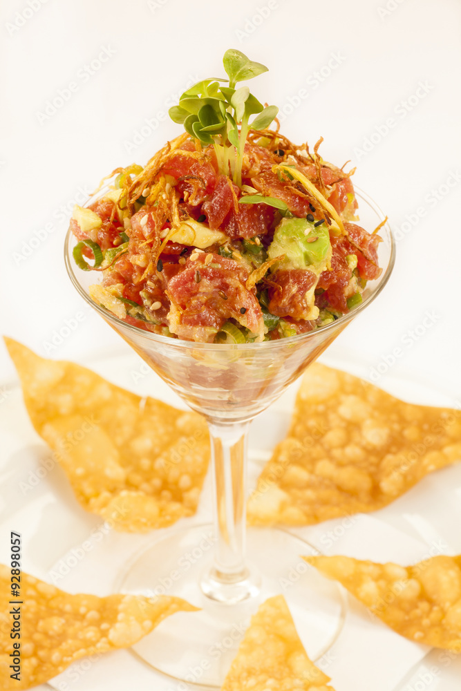 tuna tartare with avocado, spicy Yuzu vinaigrette and ginger Stock