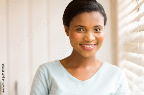 young african woman indoors
