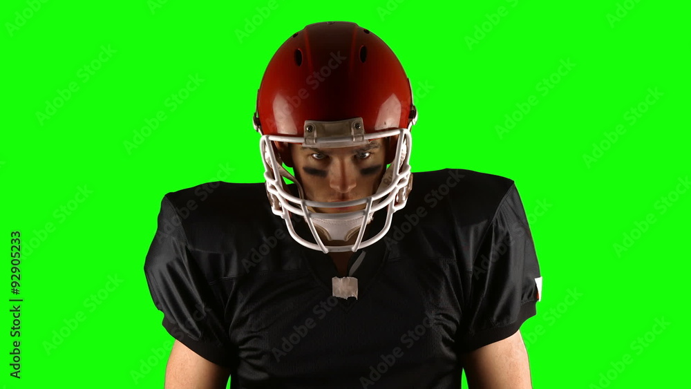 American football player on green screen American football player on green screen