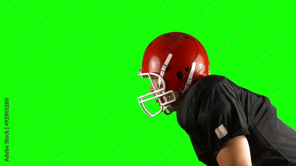 American football player on green screen American football player on green screen