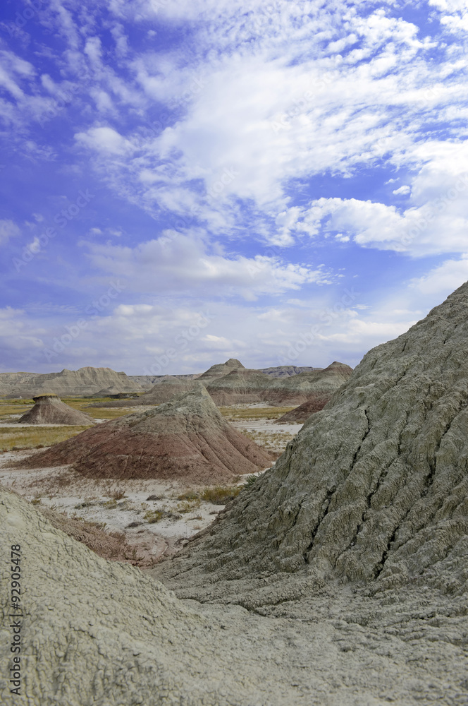 Badlands landscape, formed by deposition and erosion by wind and water, contains some of the richest fossil beds in the world, Badlands National Park, South Dakota, USA