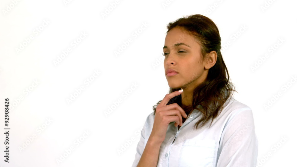Casual woman thinking on white background Casual woman thinking on white background