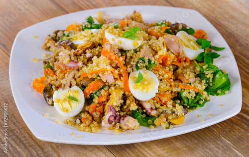 Seafood salad with quinoa and eggs