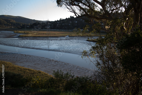 Closer View of Shallow tide on a residential ocean inlet in Nort