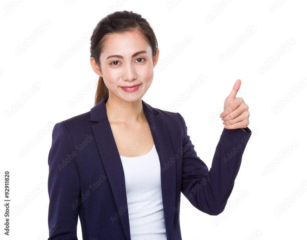 Young businesswoman with thumb up gesture Young businesswoman with thumb up gesture