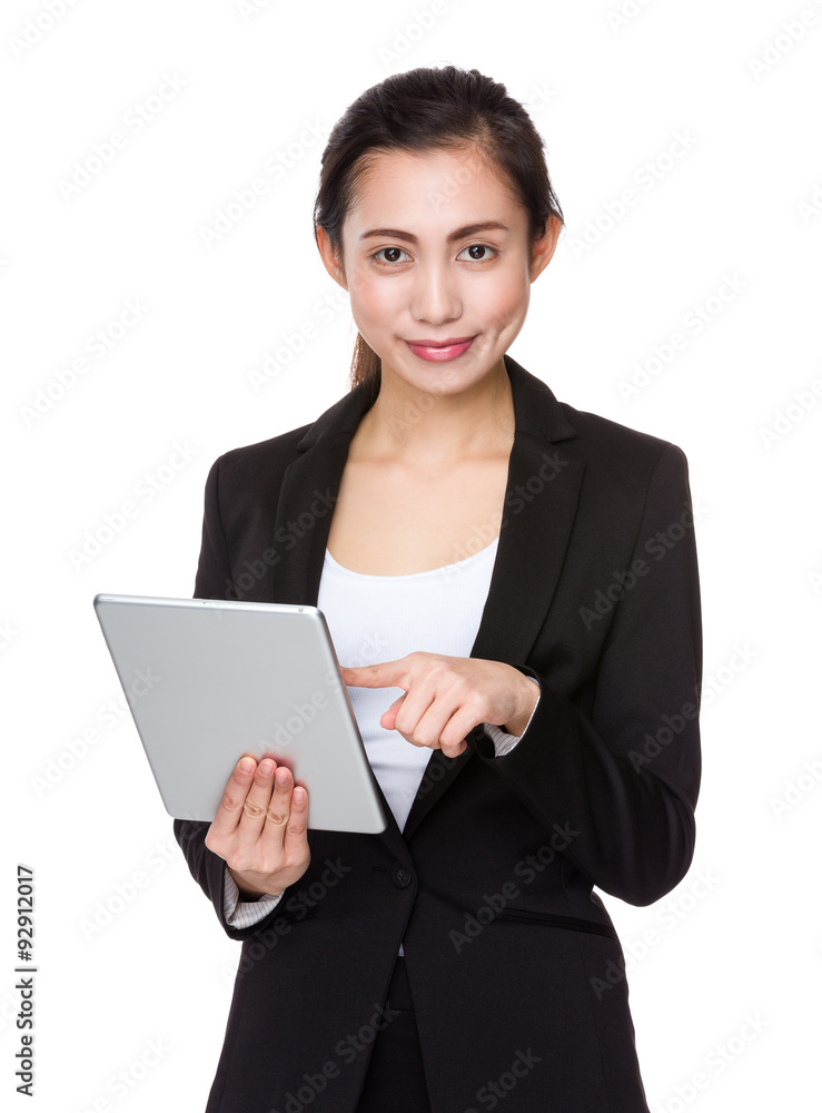 Young businesswoman use of the tablet pc Young businesswoman use of the tablet pc