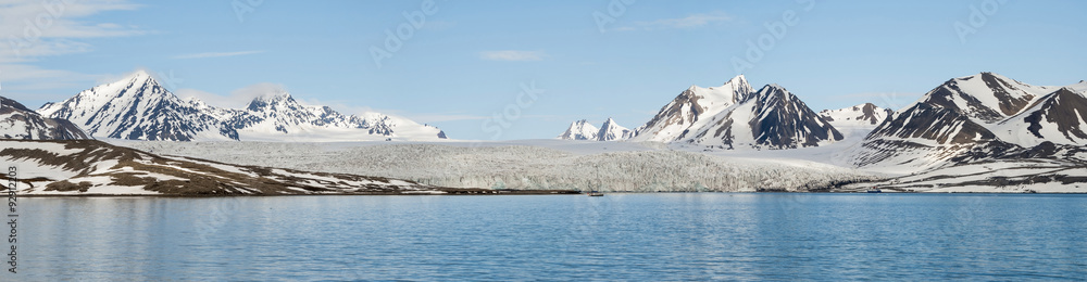 Fototapeten Arctica Arctica - Panorama of glacier above the sea with mountains behind, Svalbar #92912203