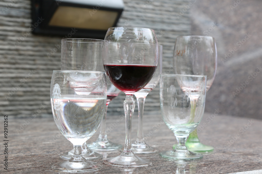 close up of Wine glass on the granite table from Side view close up of Wine glass on the granite table from Side view