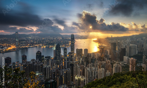 Hong Kong skyline at night and day